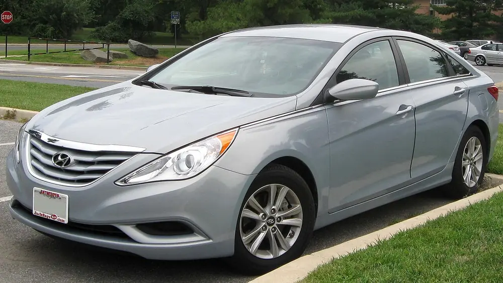 A silver 2011 Hyundai Sonata seen from the front