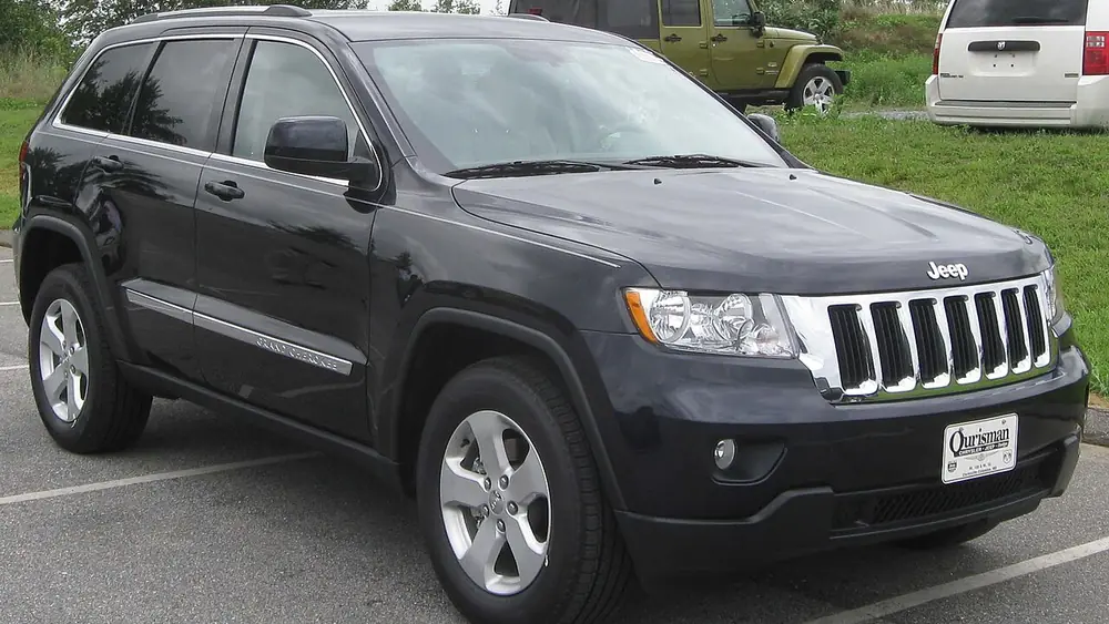 A black 2011 Jeep Grand Cherokee seen from the front