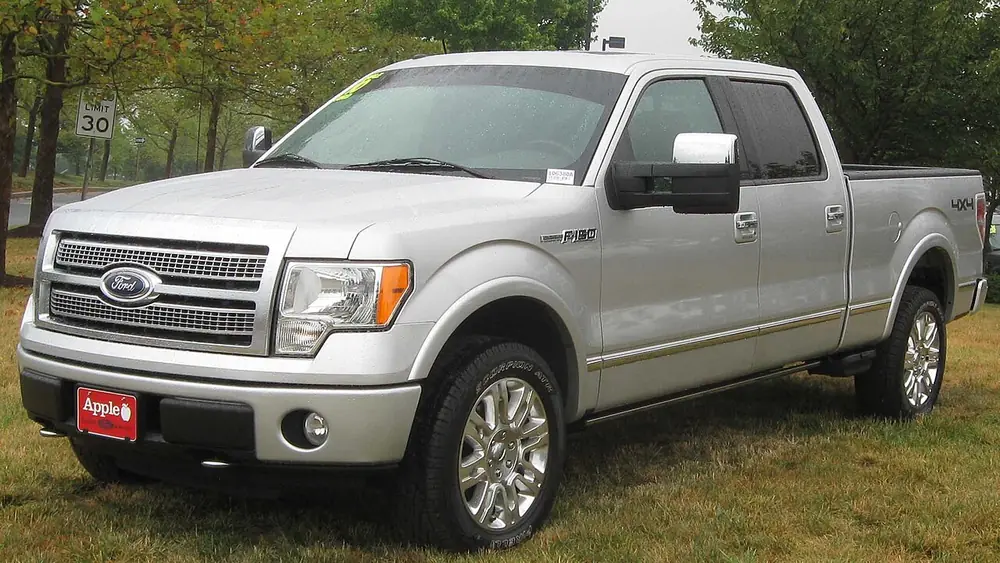 A silver 2010 Ford F-150 seen from the front
