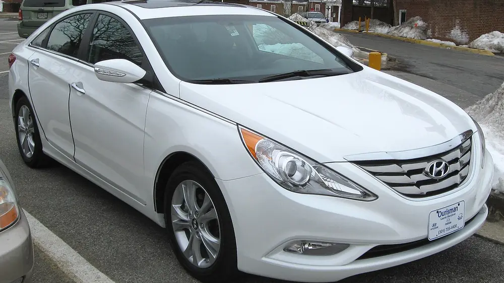 A white 2011 Hyundai Sonata seen from the front