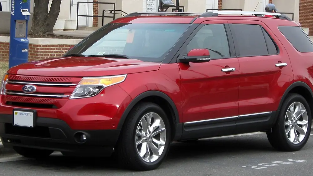 A red 2011 Ford Explorer seen from the front