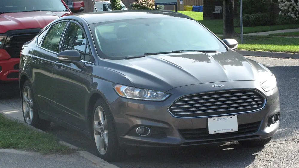 A grey 2016 Ford Fusion seen from the front
