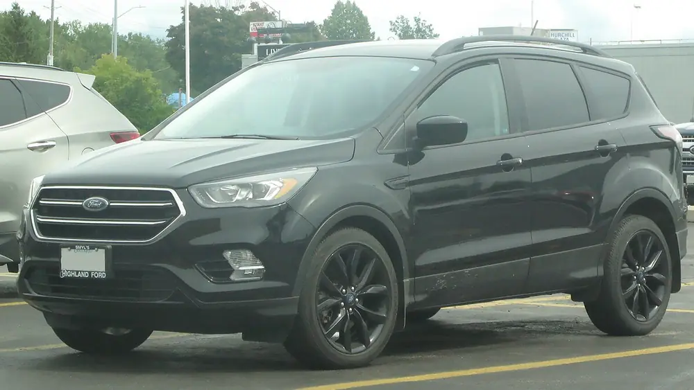 A dark grey 2018 Ford Escape seen from the front