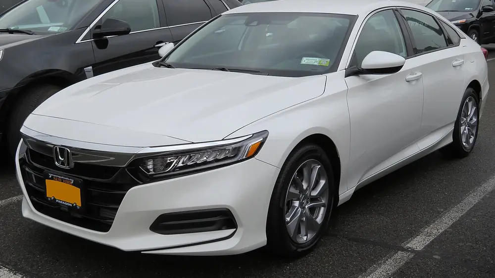A white 2018 Honda Accord seen from the front