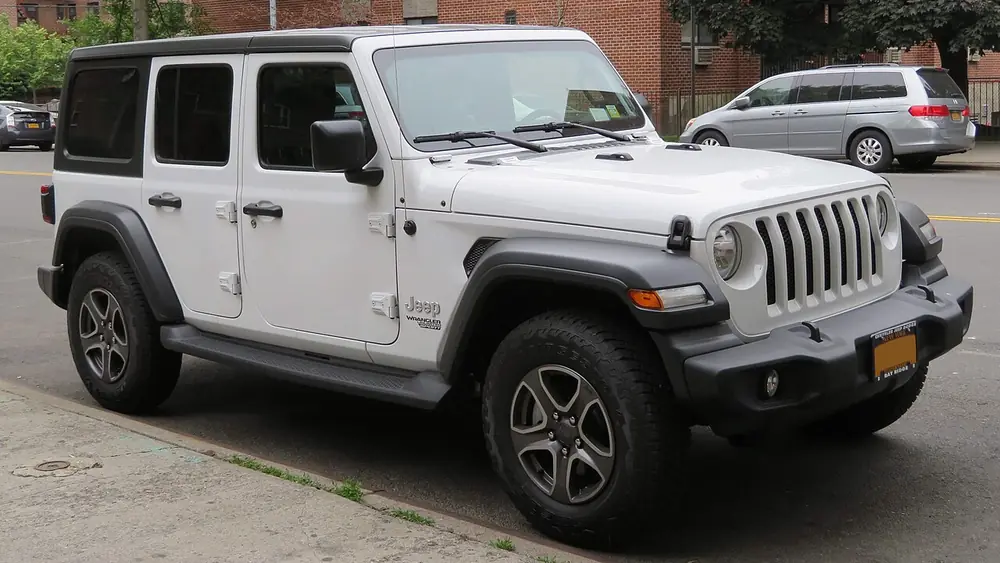 A white 2018 Jeep Wrangler Unlimited seen from the front