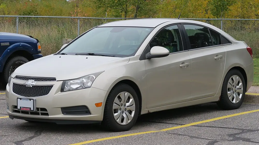 A silver 2013 Chevrolet Cruze seen from the front