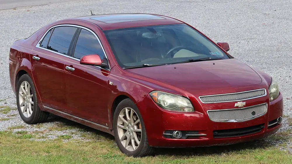 A red 2008 Chevrolet Malibu seen from the front