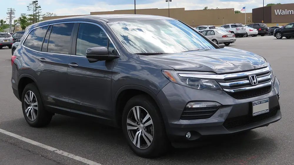 A grey 2017 Honda Pilot seen from the front