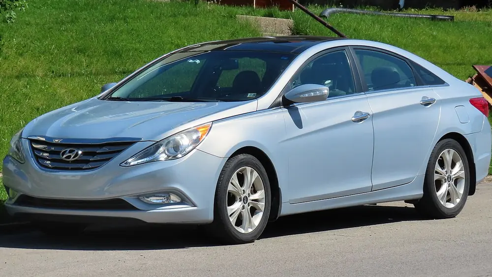 A light blue 2012 Hyundai Sonata seen from the front