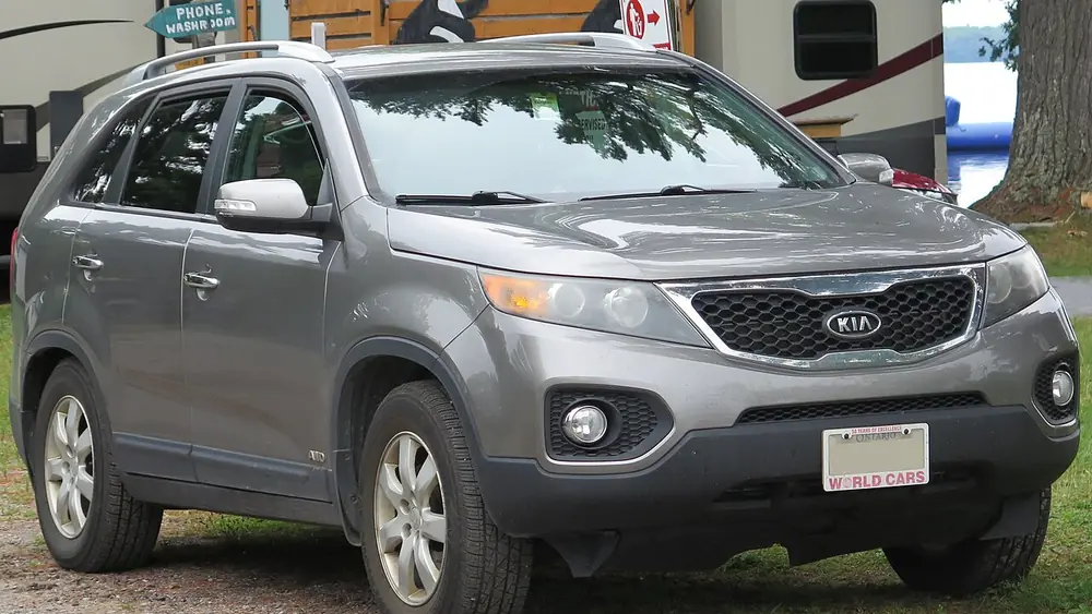 A silver 2012 Kia Sorento seen from the front
