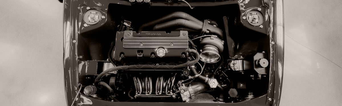 An engine bay photographed from above with the hood open