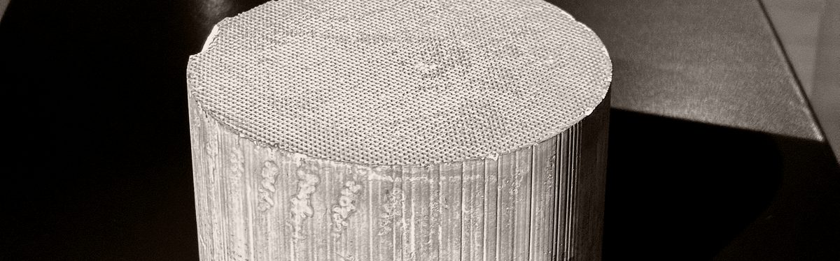 The ceramic honeycomb core of a catalytic converter, out of its casing