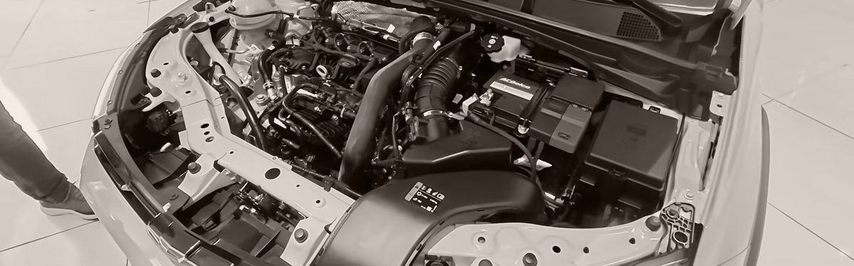 An engine bay with the hood open