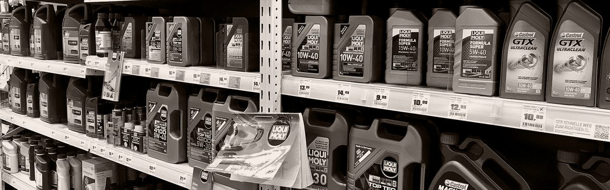 Shelves of motor oil bottles in a shop