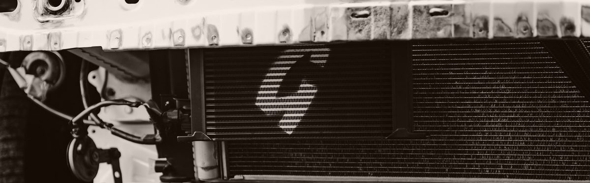 A car radiator seen through the front end