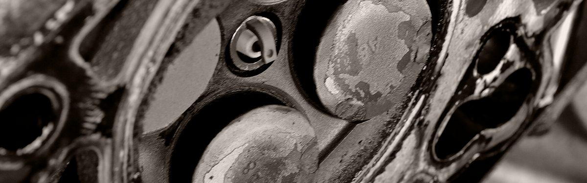 Bent intake valves in a cylinder head, after the pistons struck them when the timing belt failed