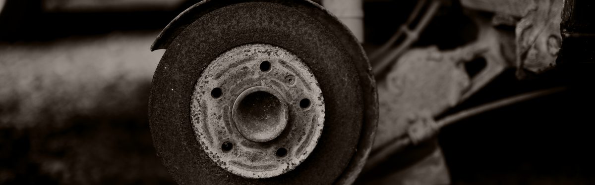A rusty brake disc on a wheel hub